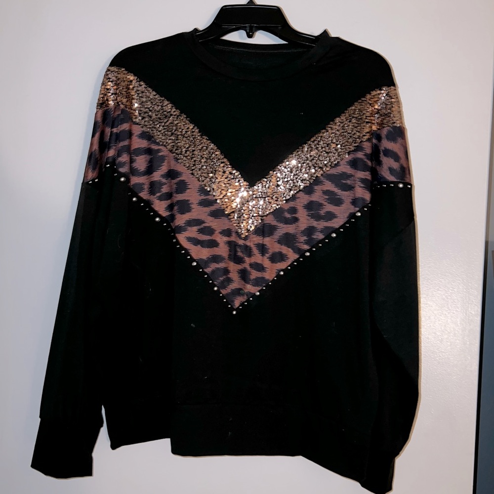 Cute dressy shirt! Great condition. Only worn once